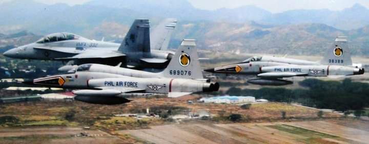 VMFA 332 F-18 Superhornet along side Philippine Air Force F-5 Freedom Fighters circa 2003: Military
